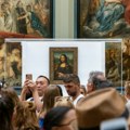 Uhapšeni nemački državljani koji su okačili svoje slike u Luvru pored "Mona Lize"