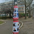 Izlepljeni plakati sa slikama članova Senata Univerziteta u Novom Sadu i pitanjem "Kako ste glasali?"