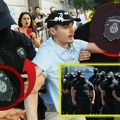 Na mrežama se deli fotka policajca s fantomkom i tetovažom i mnogi se pitaju „s kim mi to imamo posla“