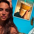 Ау! Барбара Бобак само у доњем делу бикинија, препланула гуза у првом плану, а преко голих леђа ватрени знак