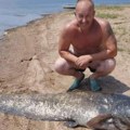 Ivan ulovio grdosiju od 60 kilograma! Pogledajte kolikog je soma izvukao iz Vlasine (foto)