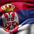 Severni deo Kosovske Mitrovice oblepljen plakatima sa srpskom trobojkom