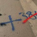 Novi Sad išaran grafitima precrtanog broja +384