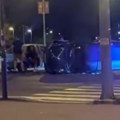 Saobraćajna nezgoda na Novom Beogradu: Automobil prevrnut na bok, policija na terenu (video)