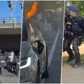 Pakao u Ženevi, sve gori uoči samita G7! Opšti haos na ulicama, krvava karikatura američkog predsednika na začelju kolone…