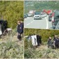 Prvi snimci sa mesta strašne nesreće u Crnoj Gori: Izvlače putnike iz provalije, poginulo troje (video)
