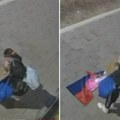 Skinula i zapalila srpsku zastavu: Skandal u Novom Sadu, prolaznici nemo posmatrali (video)