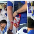 Sramotan napad, podržao Bosnu sa zastavom Srbije pa nasrnuli na njega Ekstremni navijači oteli trobojku na stadionu (video)