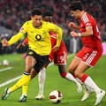 Kejn predstavio Zlatnu loptu na "Alijanc" areni pa promašio penal, Dortmund otkinuo bodove Bajernu u samom finišu