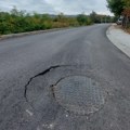 Asfalt u Suvom Dolu, star dva meseca, već se podiže i puca
