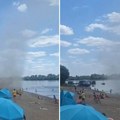 Panika na plaži u Sremskoj Mitrovici: "Mini tornado" uplašio kupače, stvari letele u vazduh Video