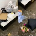 Potresna scena u BG: Mlada kreatorka jeca nad uništenim studiom i stvarima u poplavi (VIDEO)