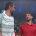 (VIDEO) Poslušajte čemu su se Đoković i Čilić smejali posle meča