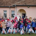 Radost koja nema cenu: Meridian fondacija novogodišnjim paketićima obradovala mališane na Kosovu i Metohiji