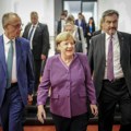 Angela Merkel: Čini se da je Tramp fasciniran Putinom