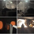 Дим у кабини, авион гори, а у њему... Снимак оставља без даха, добро погледајте реакцију посаде и путника! (видео)