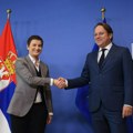 Komesar Varhelji s premijerkom Brnabić: Srbija i region da iskoriste zamah