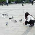 Slika dana: Kiša, Nikolija i golubovi