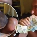 Đani posle svadbe završio polugo na podu! Oko njega muškarci bez majica, ljube ga u glavu, on jedva drži novac