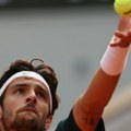 Italijanski teniser Lorenco Muzeti prvi polufinalista Rolan Garosa